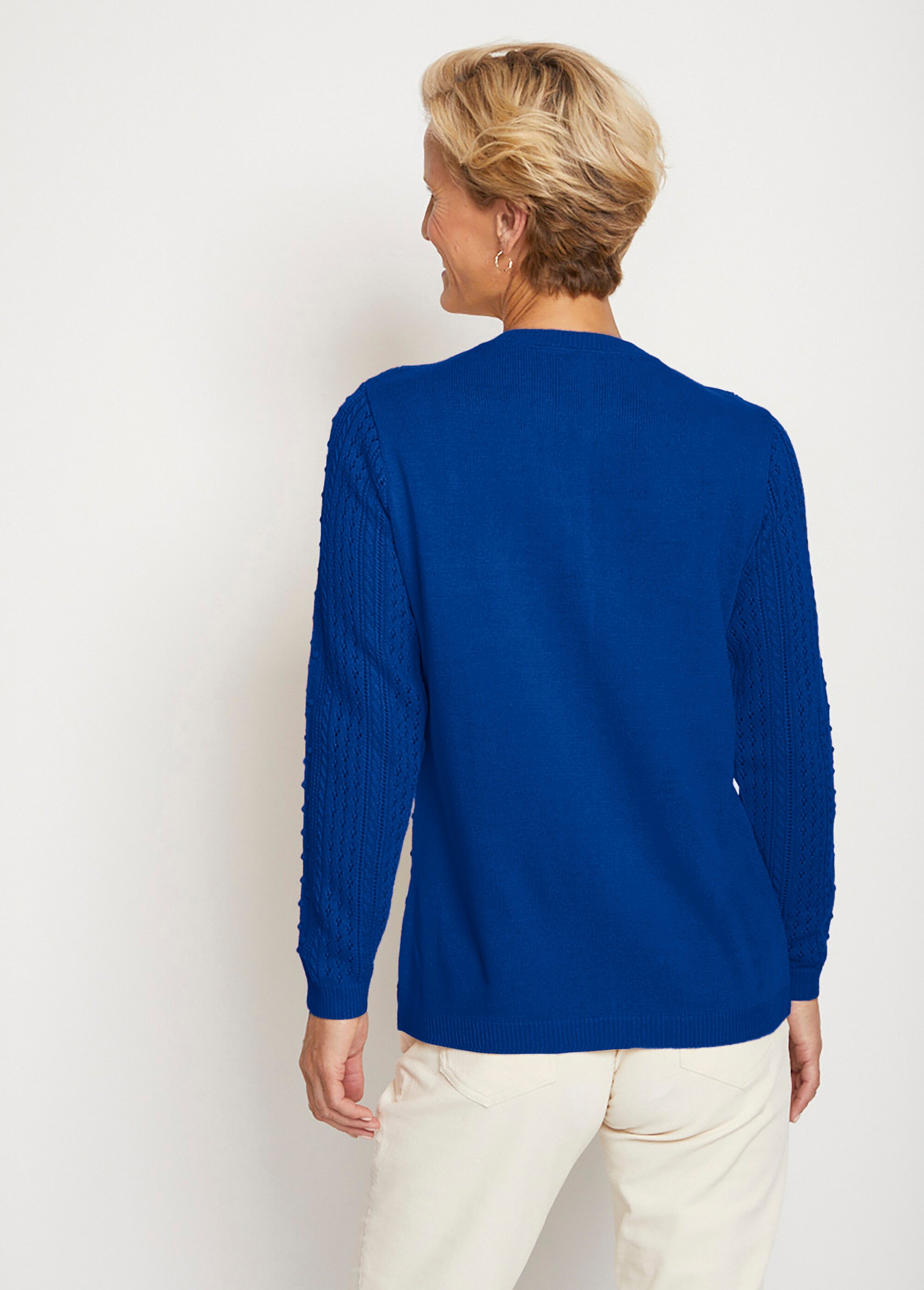 Pull col rond maille ajourée et boules
