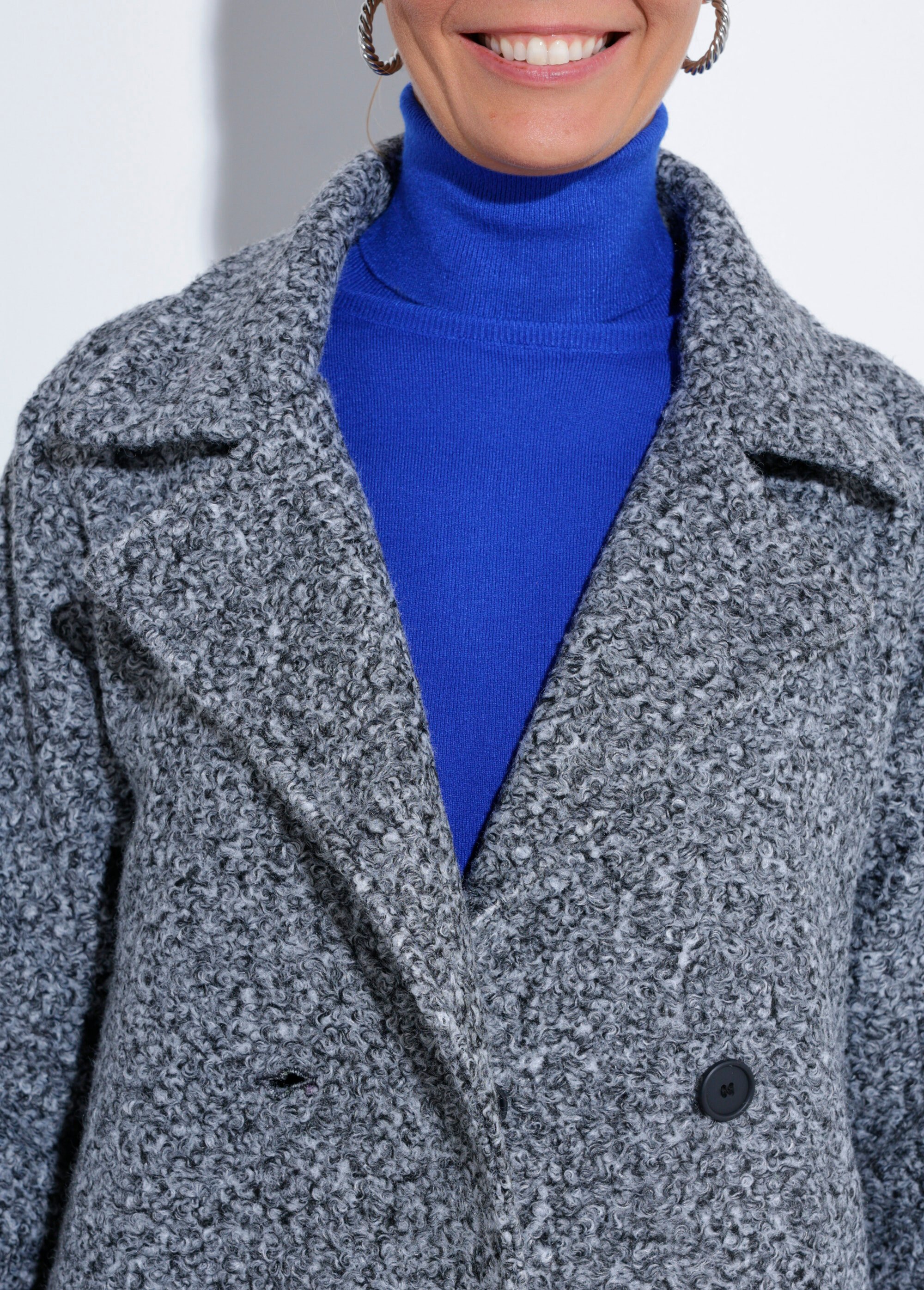 Caban long uni façon laine bouclée