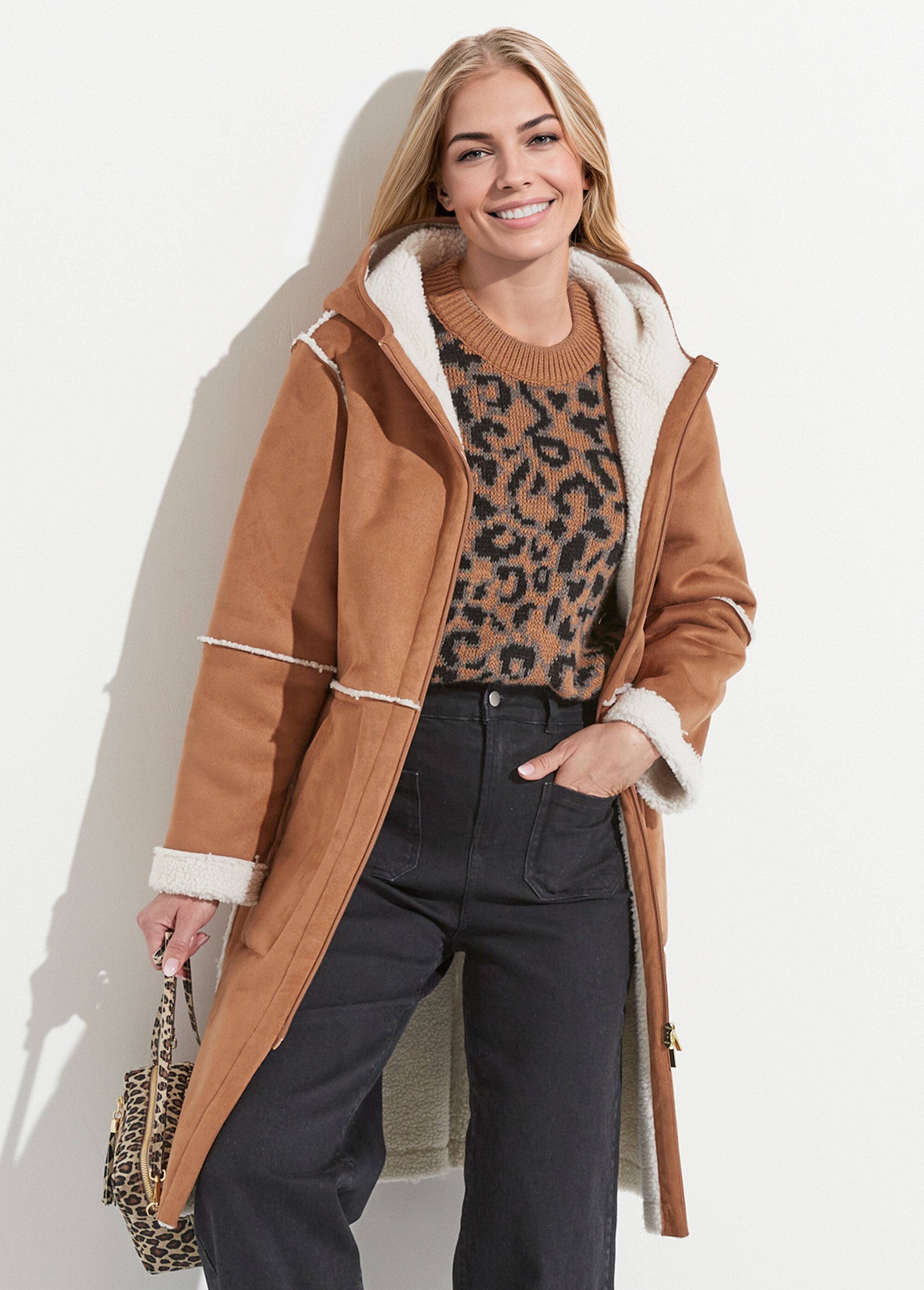 Manteau zippé à capuche effet peau lainée chaud