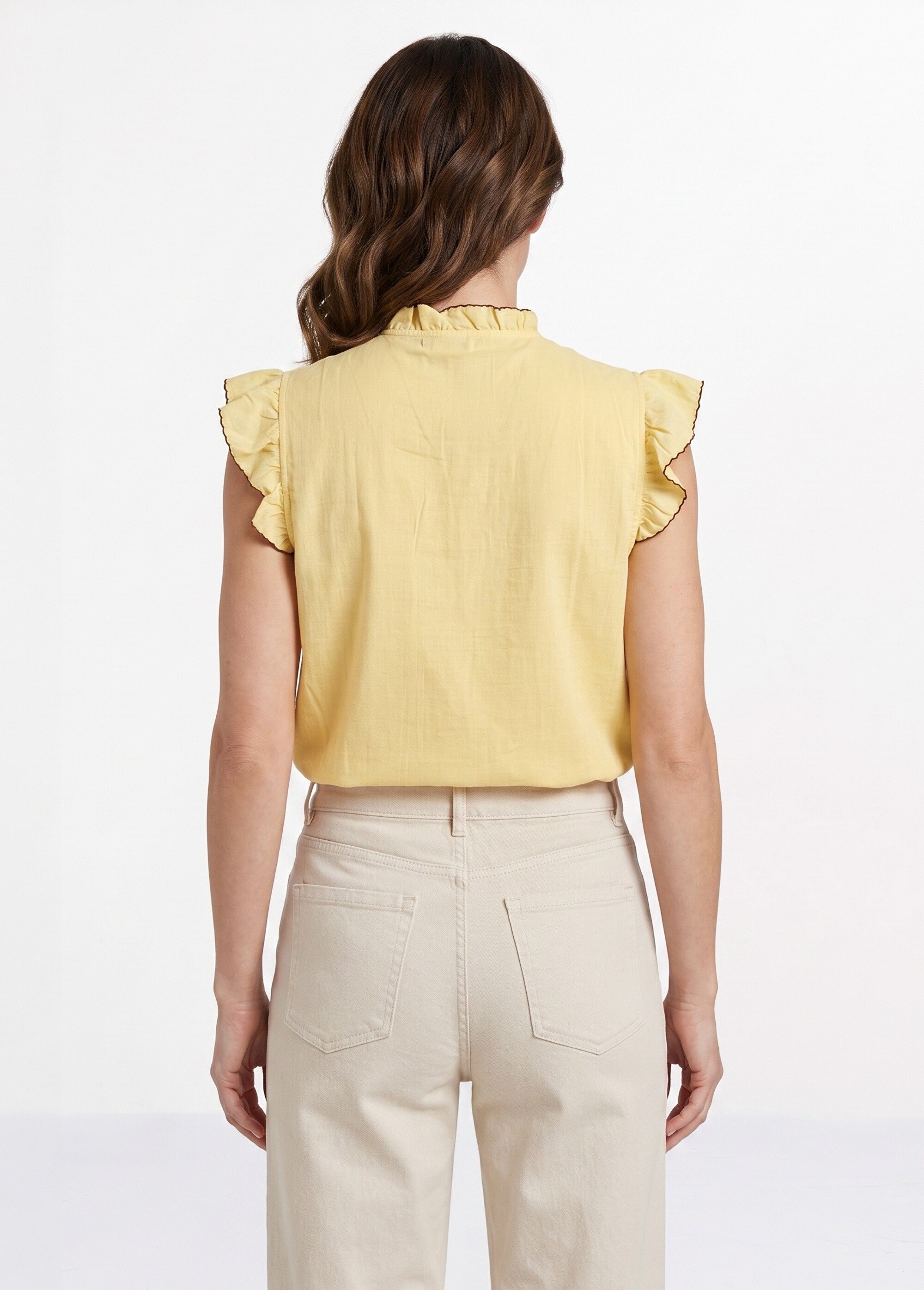Blouse à sequins et broderies et volants