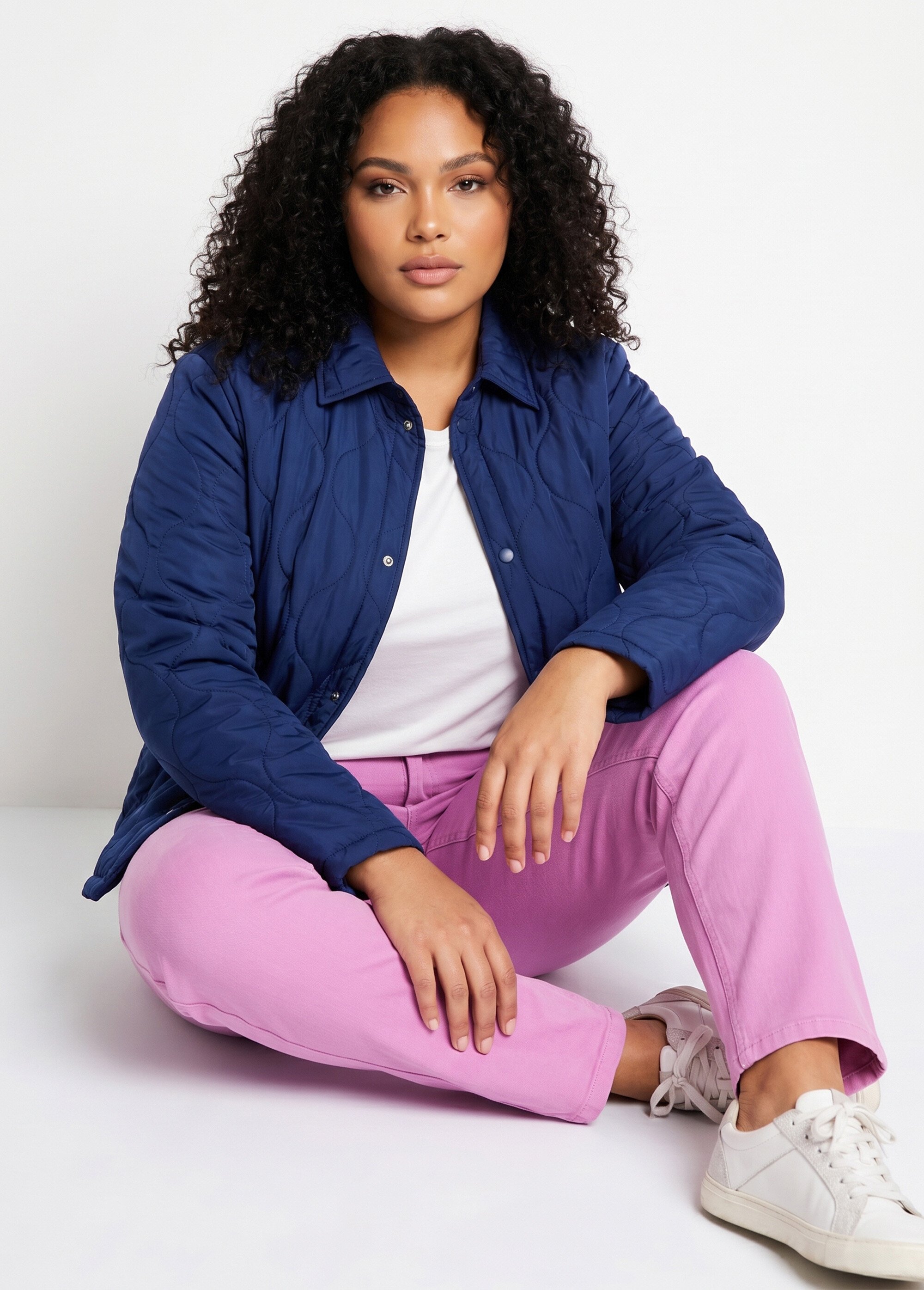 Veste courte matelassée pressionnée