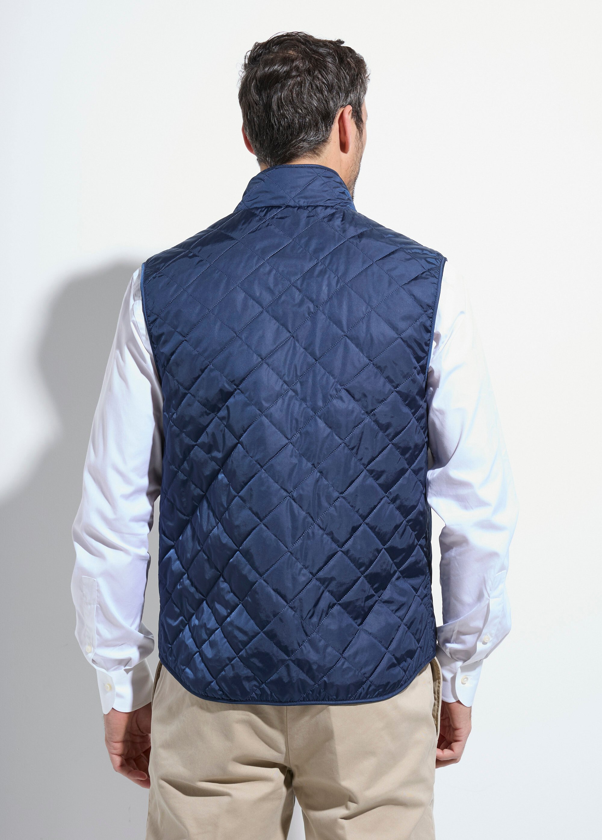 Veste sans manches matelassée avec surpiqûres