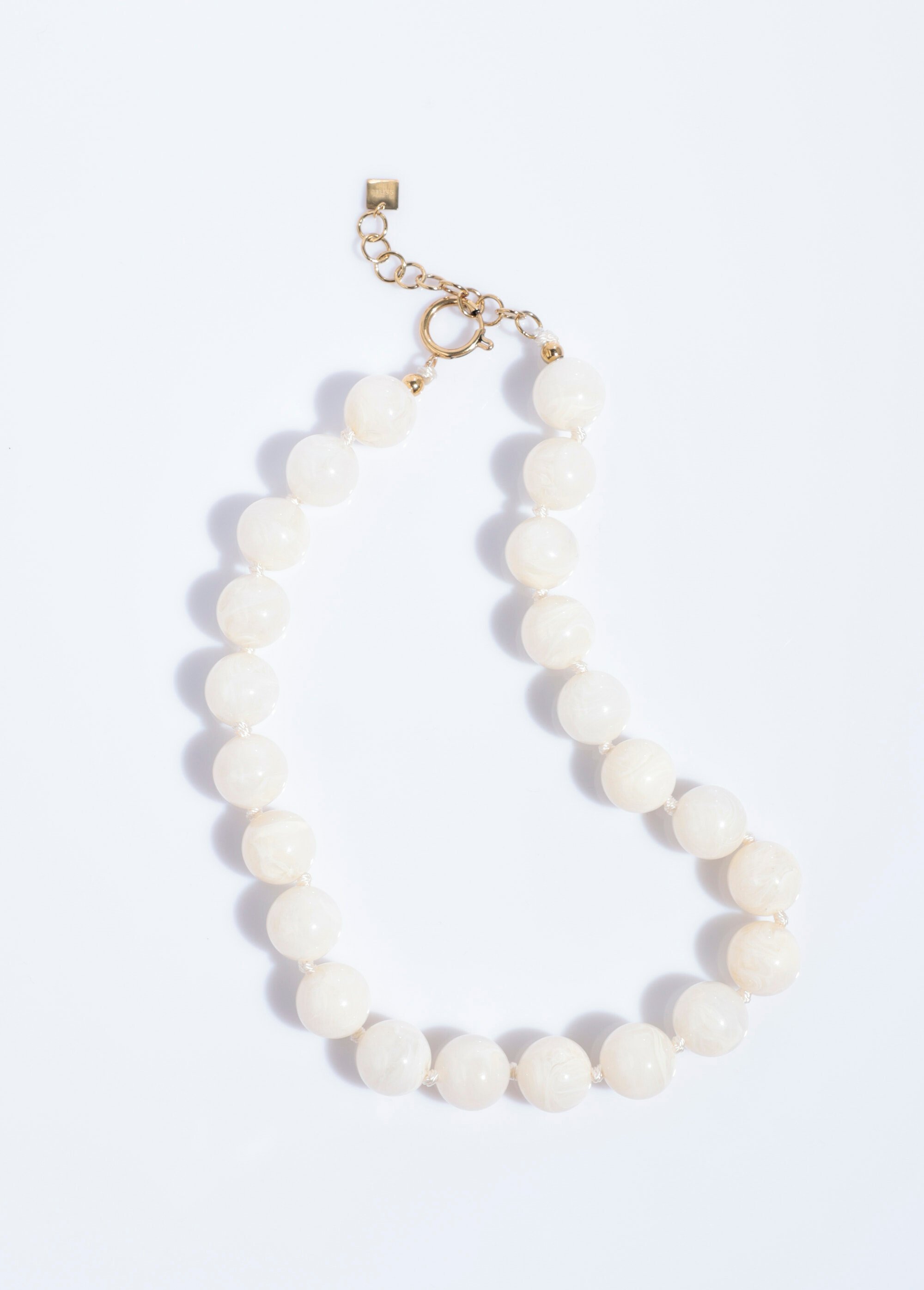 Collier court perles rondes marbrées