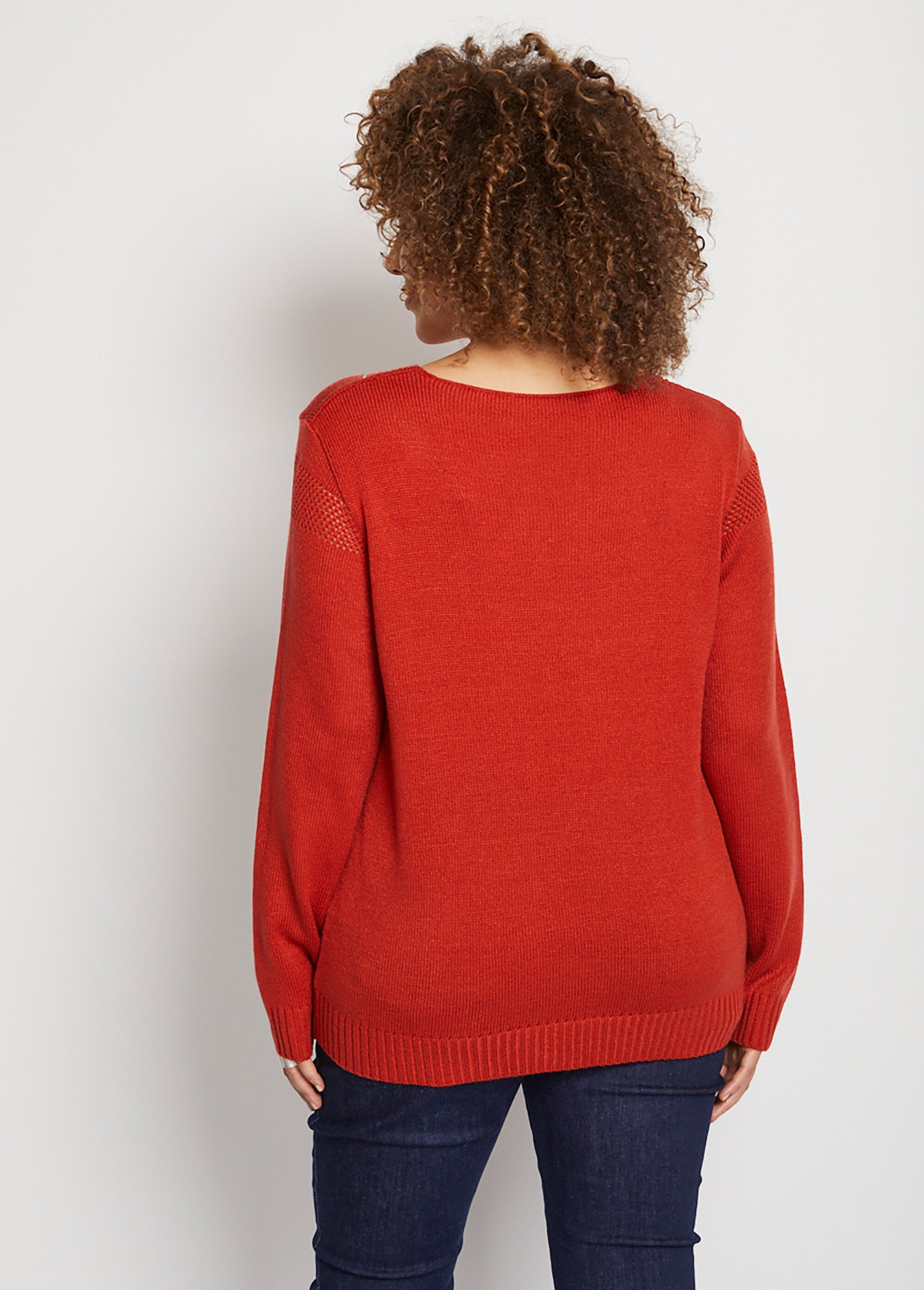 Pull bijou maille filet strass col V
