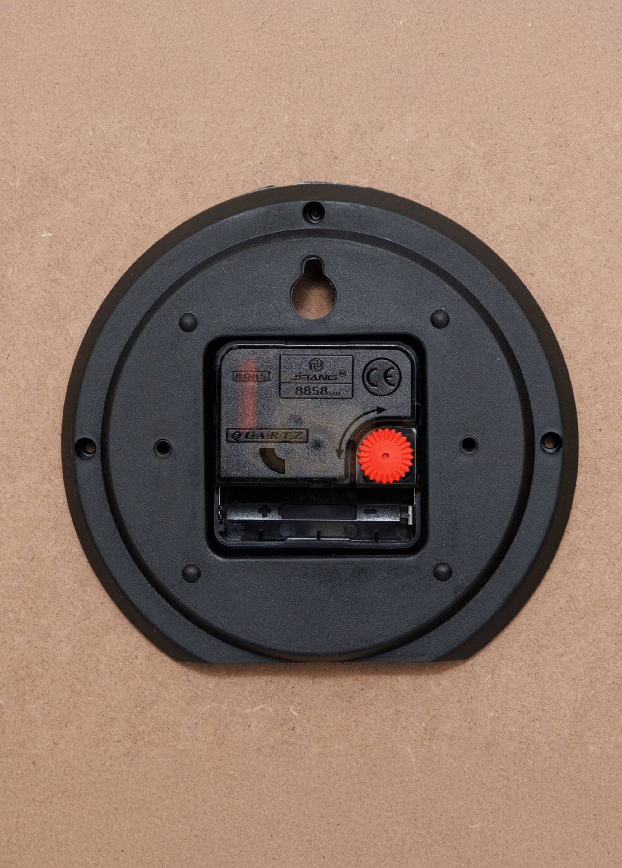 Horloge motif abstrait cadre aspect bois Beige JJA-210452 DE2