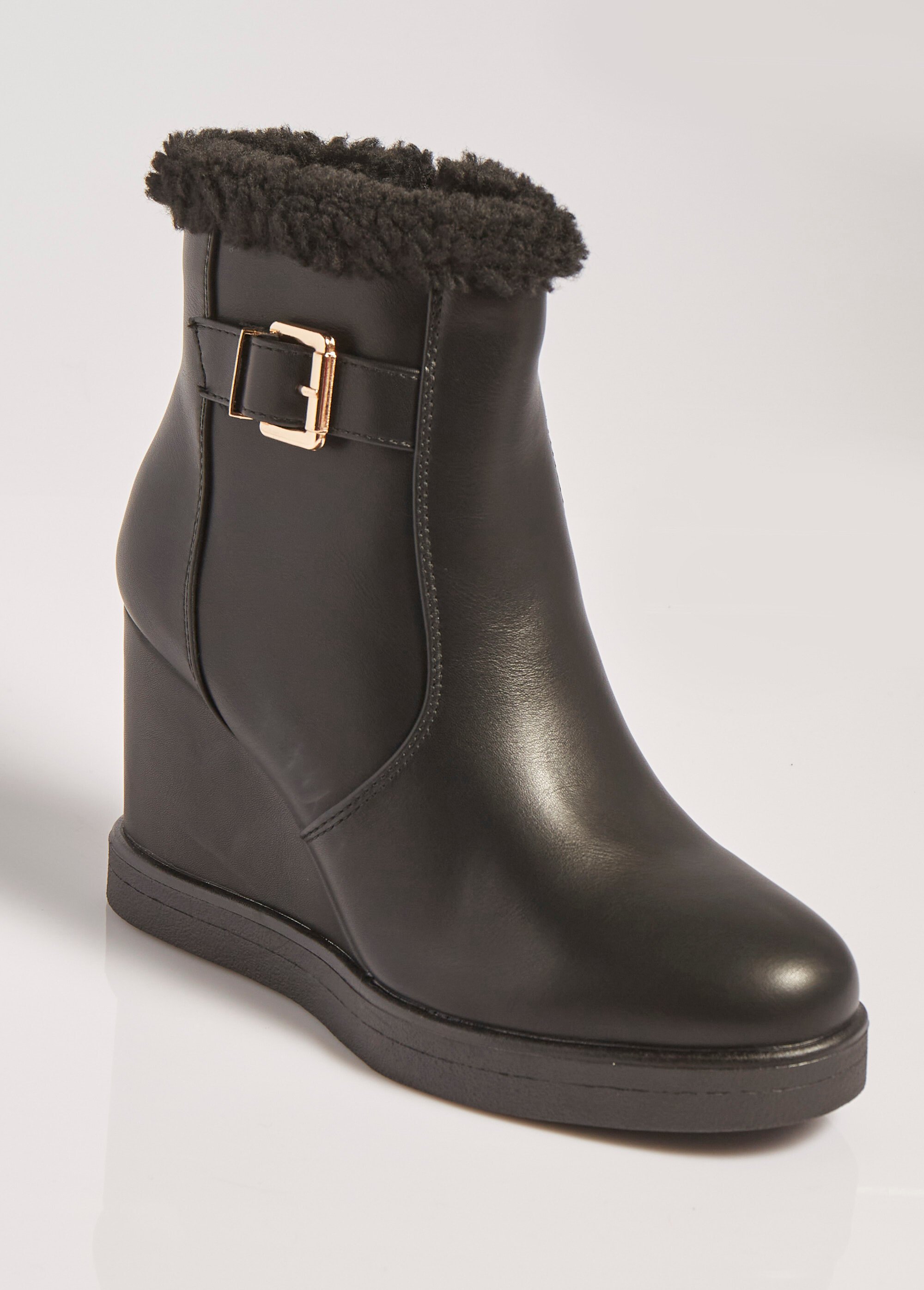 Boots fourrées à talon compensé