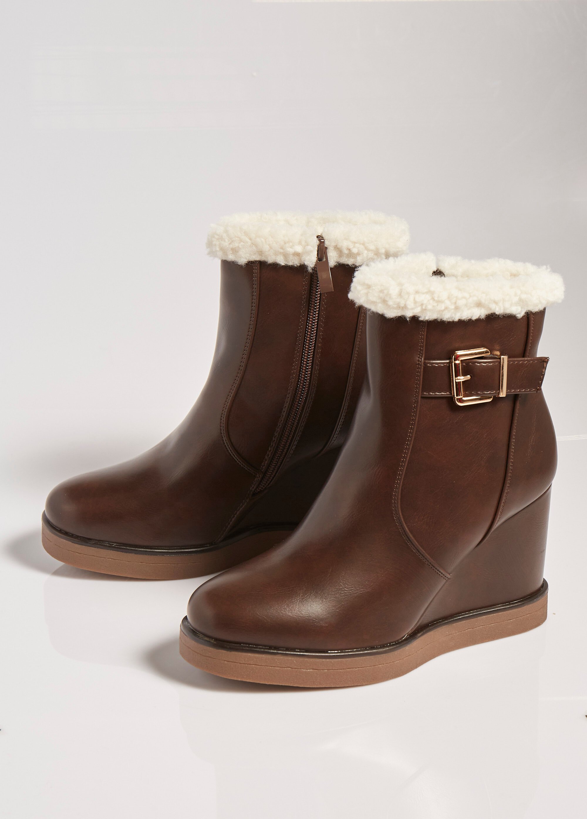 Boots fourrées à talon compensé