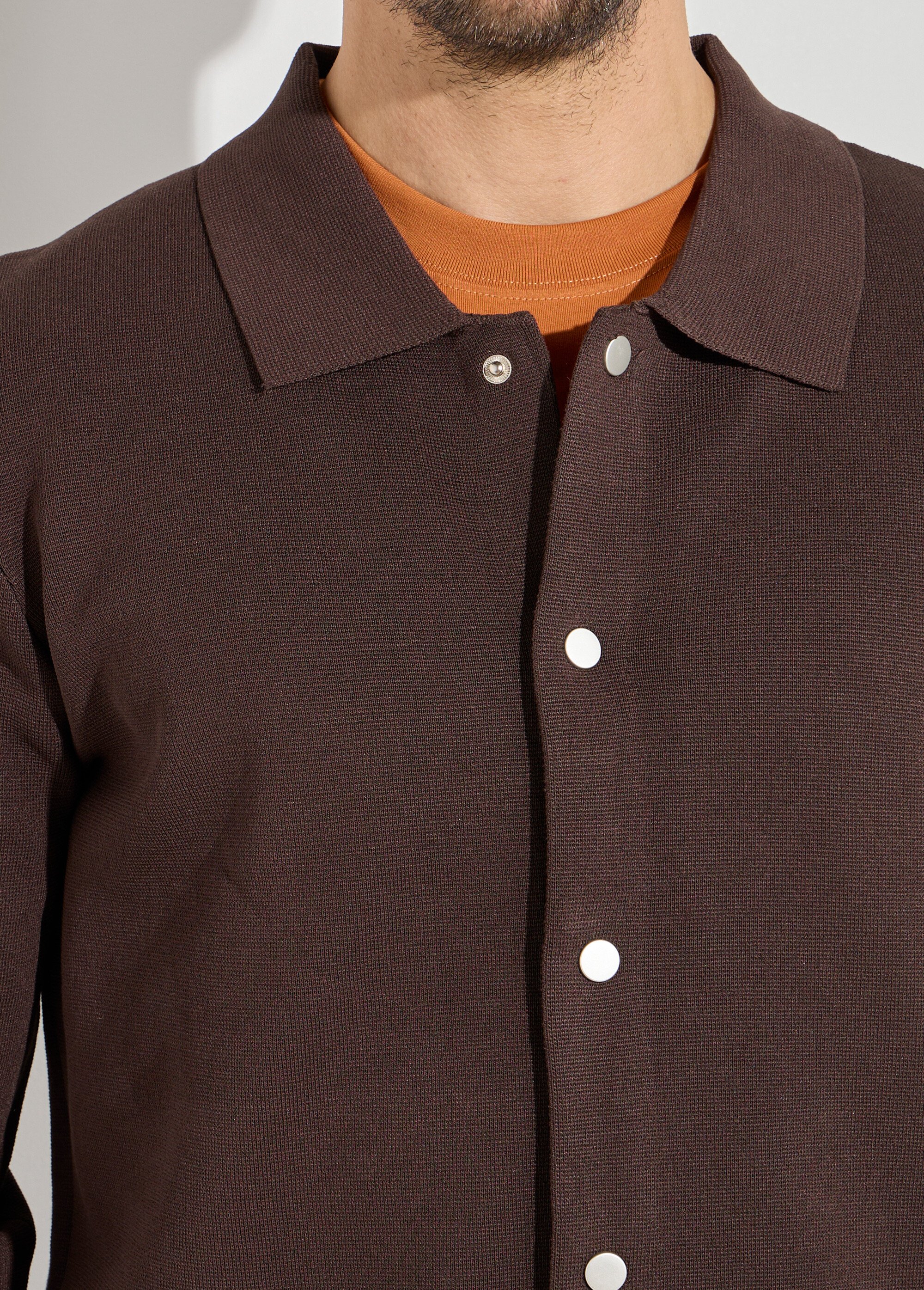 Gilet pressionné en maille jacquard