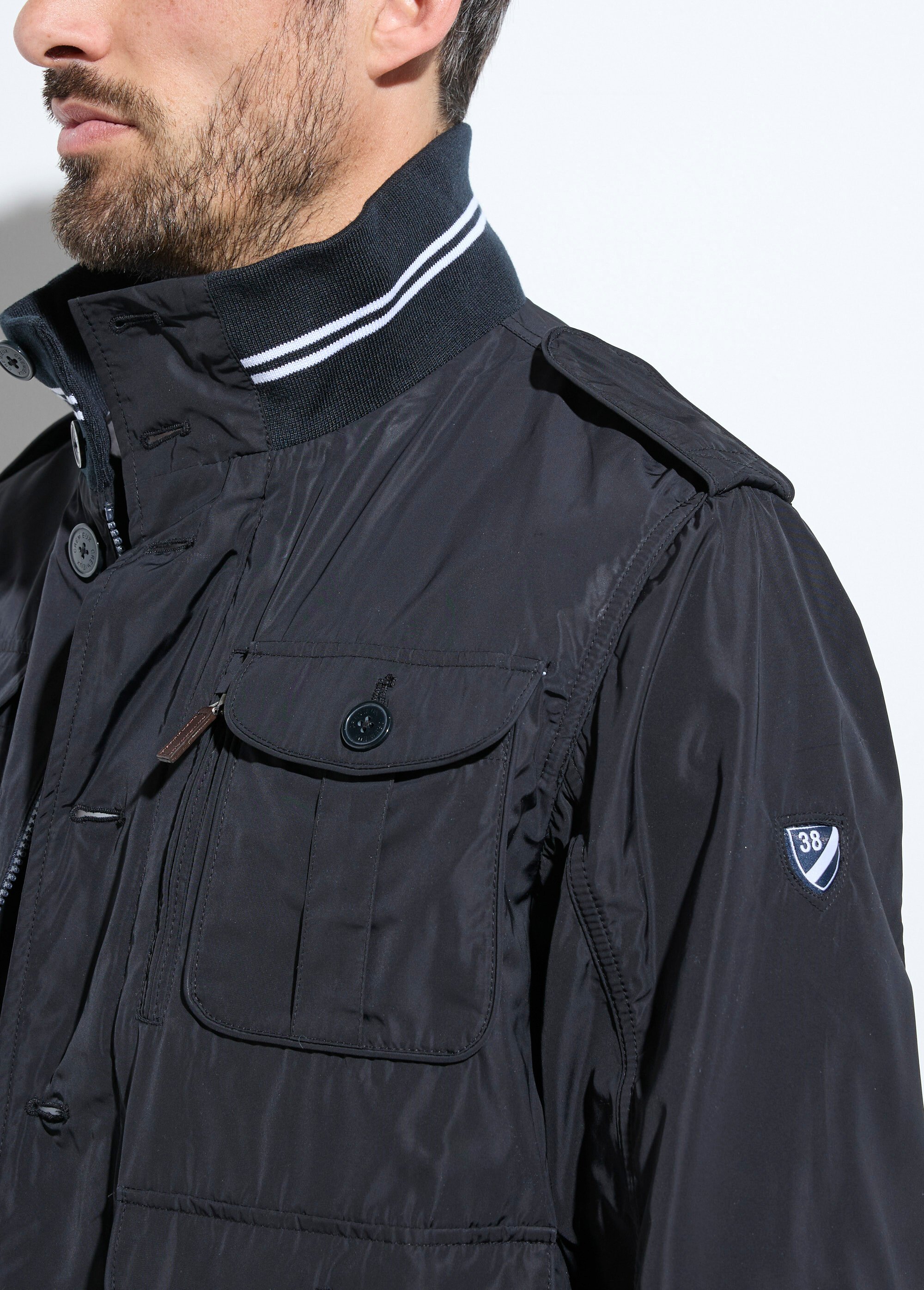 Veste déperlante détails bord côtes multipoches