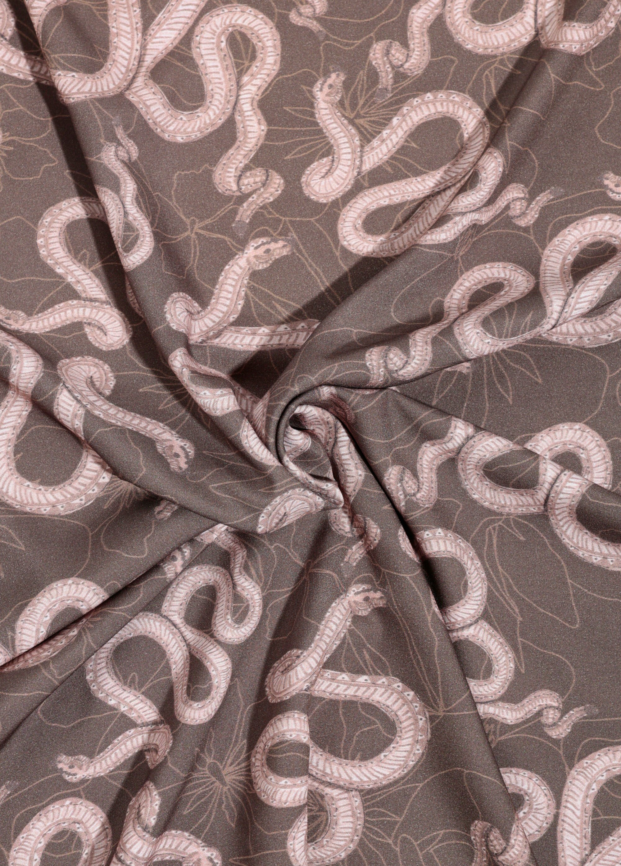 Coupon tissu habillement, motif serpent