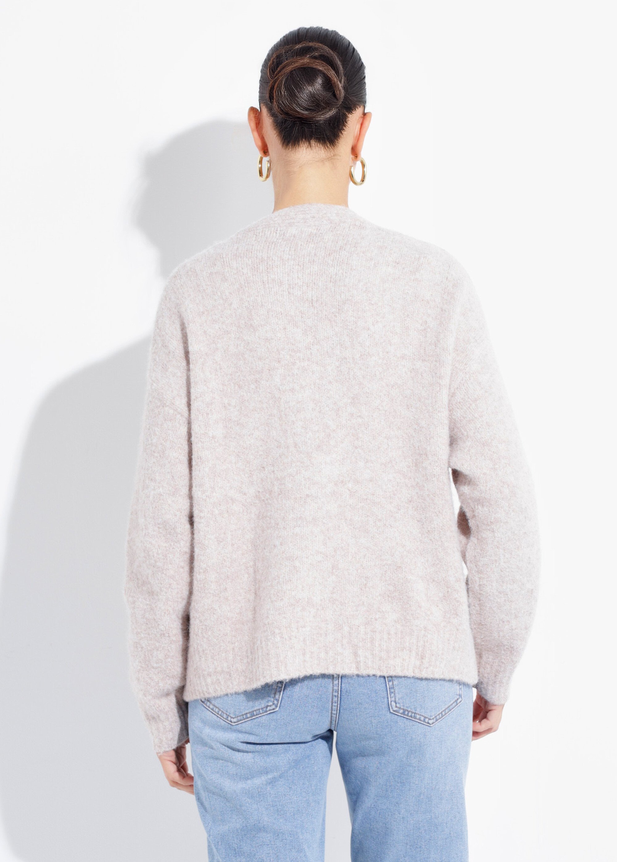 Gilet chaud avec boutons bijou en métal