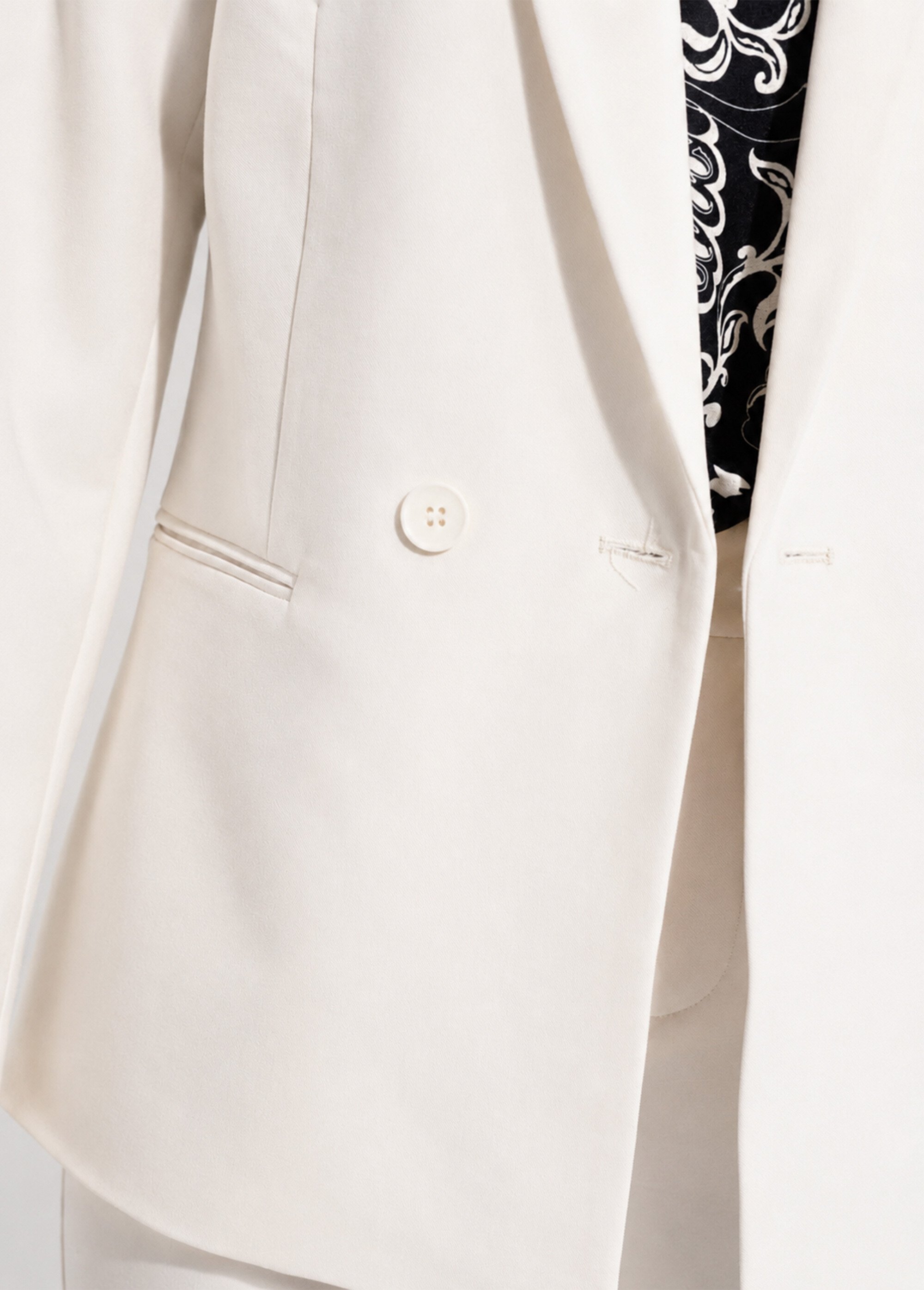Veste tailleur unie fluide double boutonnage