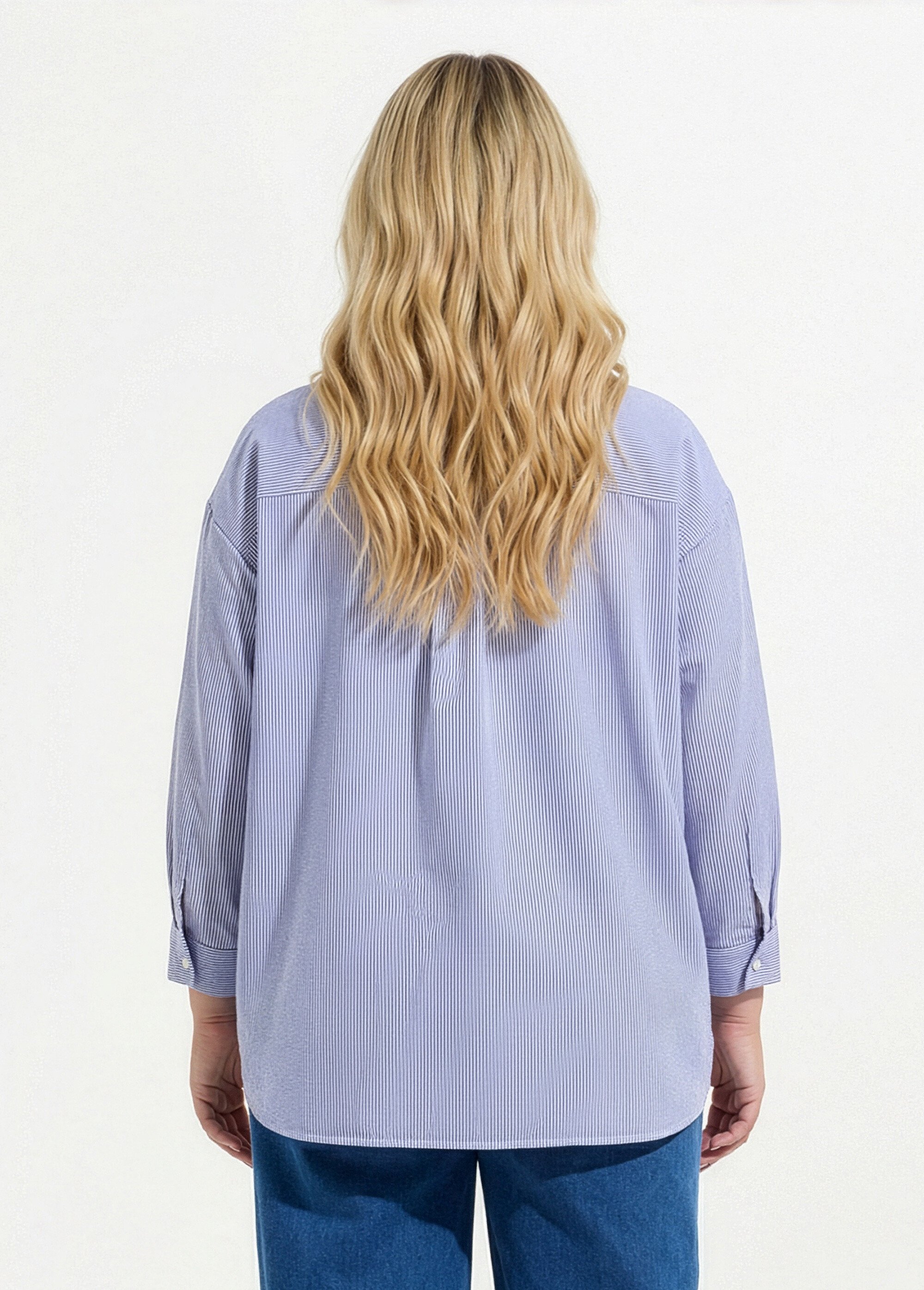 Blouse col V en seersucker fines rayures