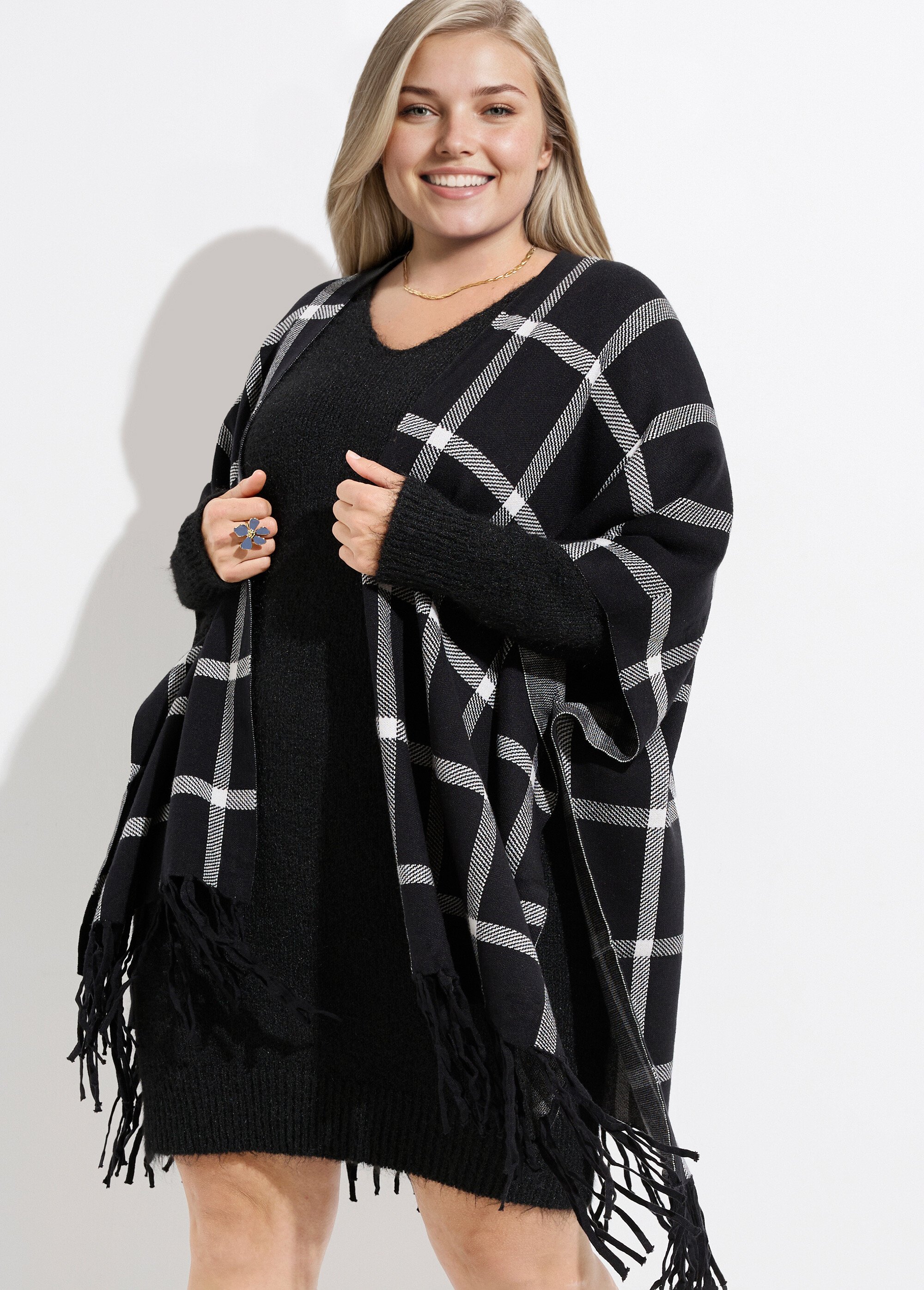 Poncho cape en maille, motif carreaux