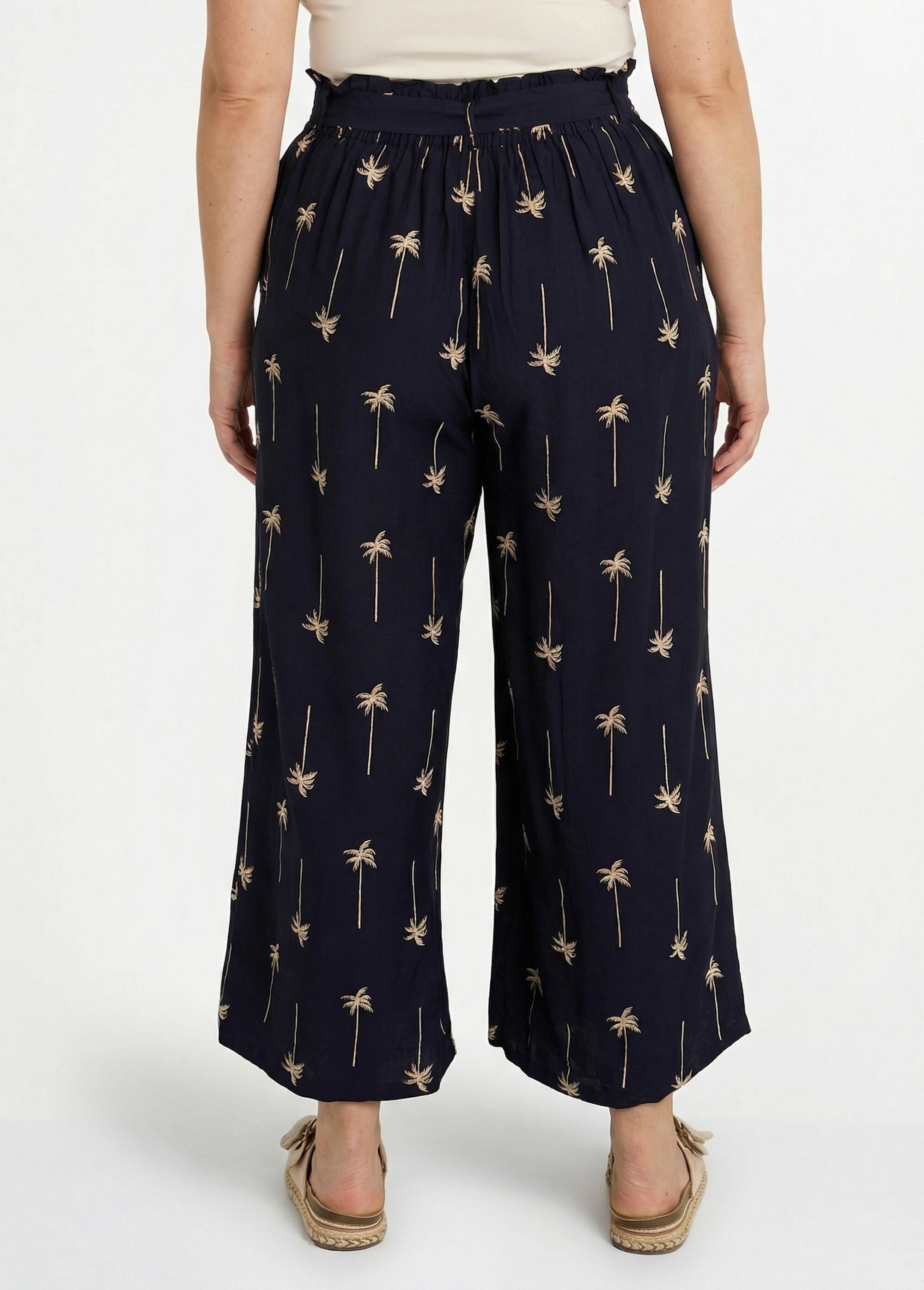 Pantalon large avec broderies palmiers