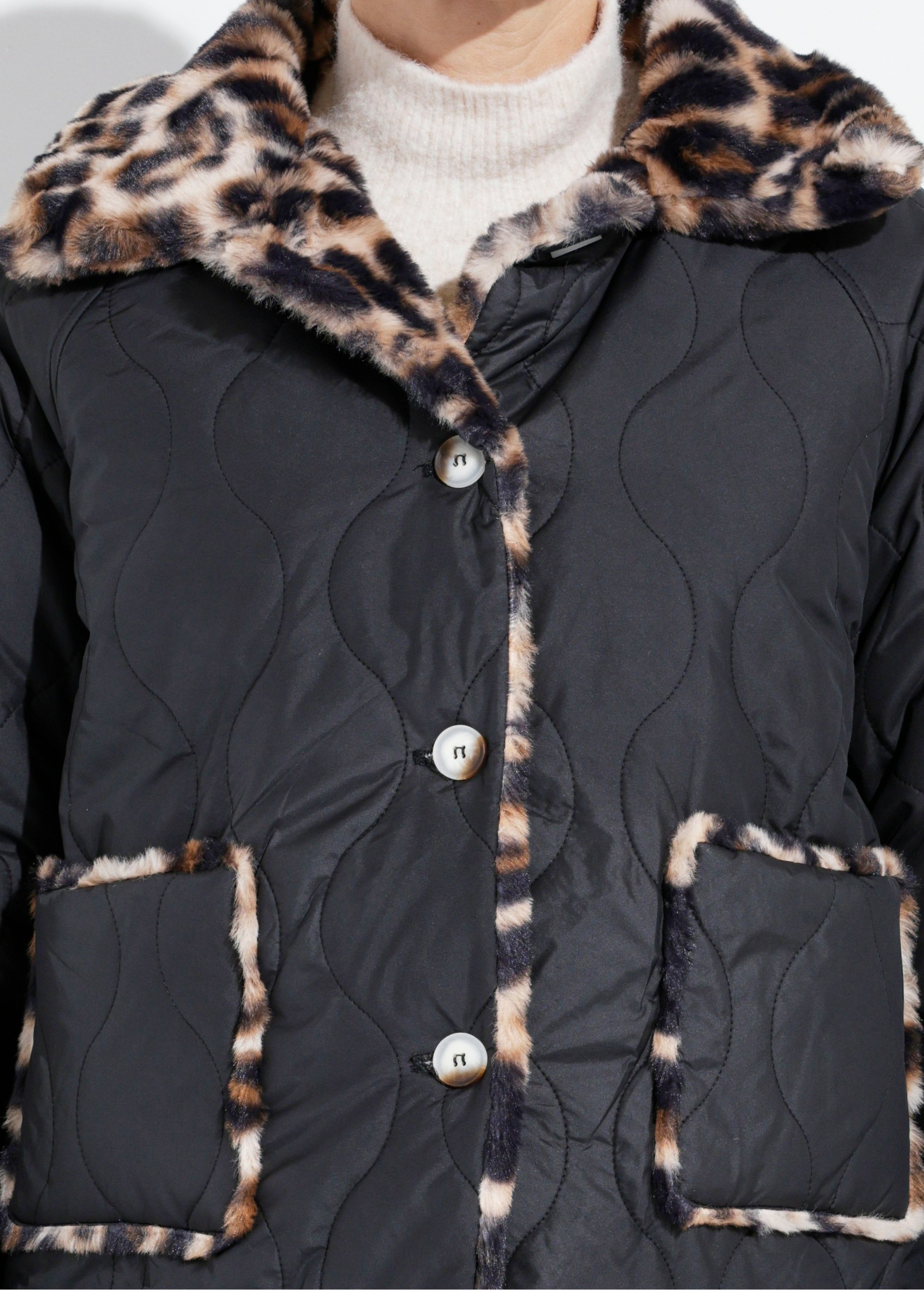 Veste matelassée réversible léopard fourrure