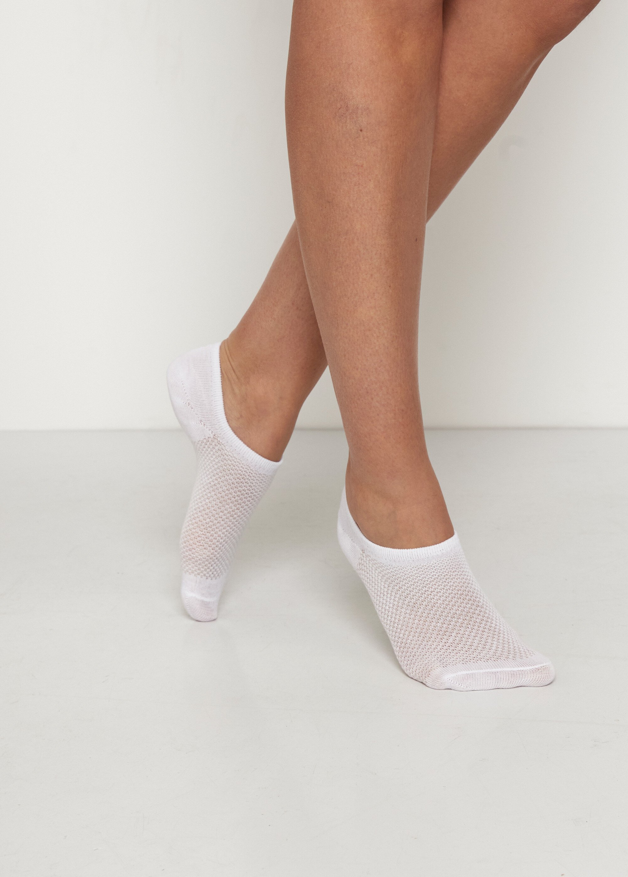 Protège-pieds en coton majoritaire