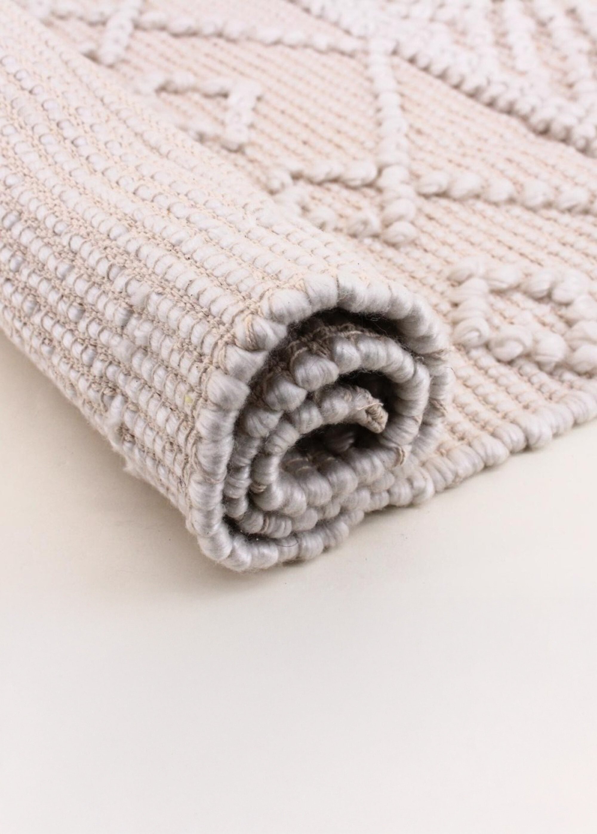 Tapis motifs en relief boules, 110x60cm