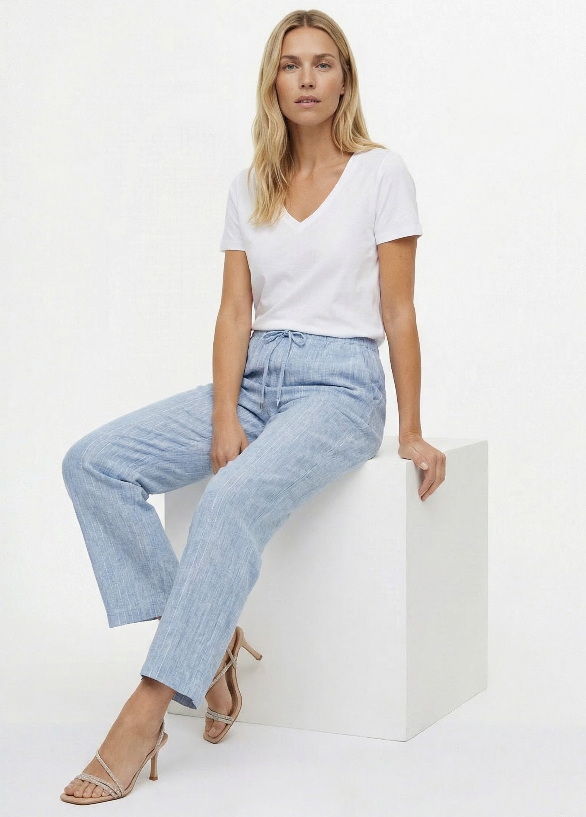 Pantalon tailleur rayé aspect irrégulier