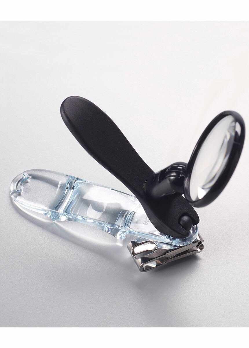 Coupe-ongles rotatif avec loupe