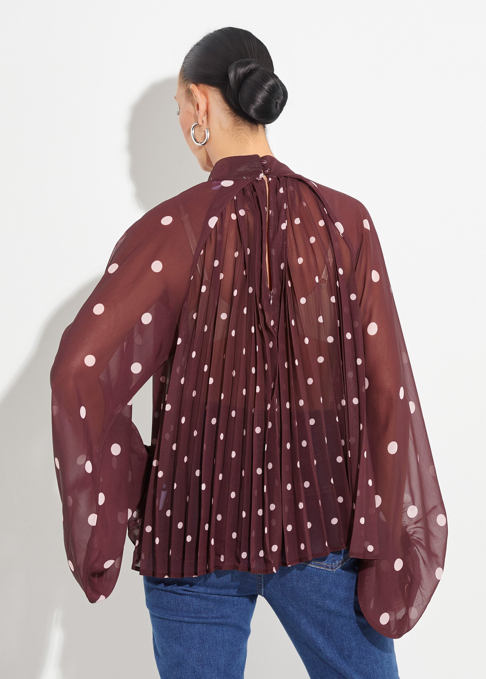 Chemisier à pois et manches bouffantes