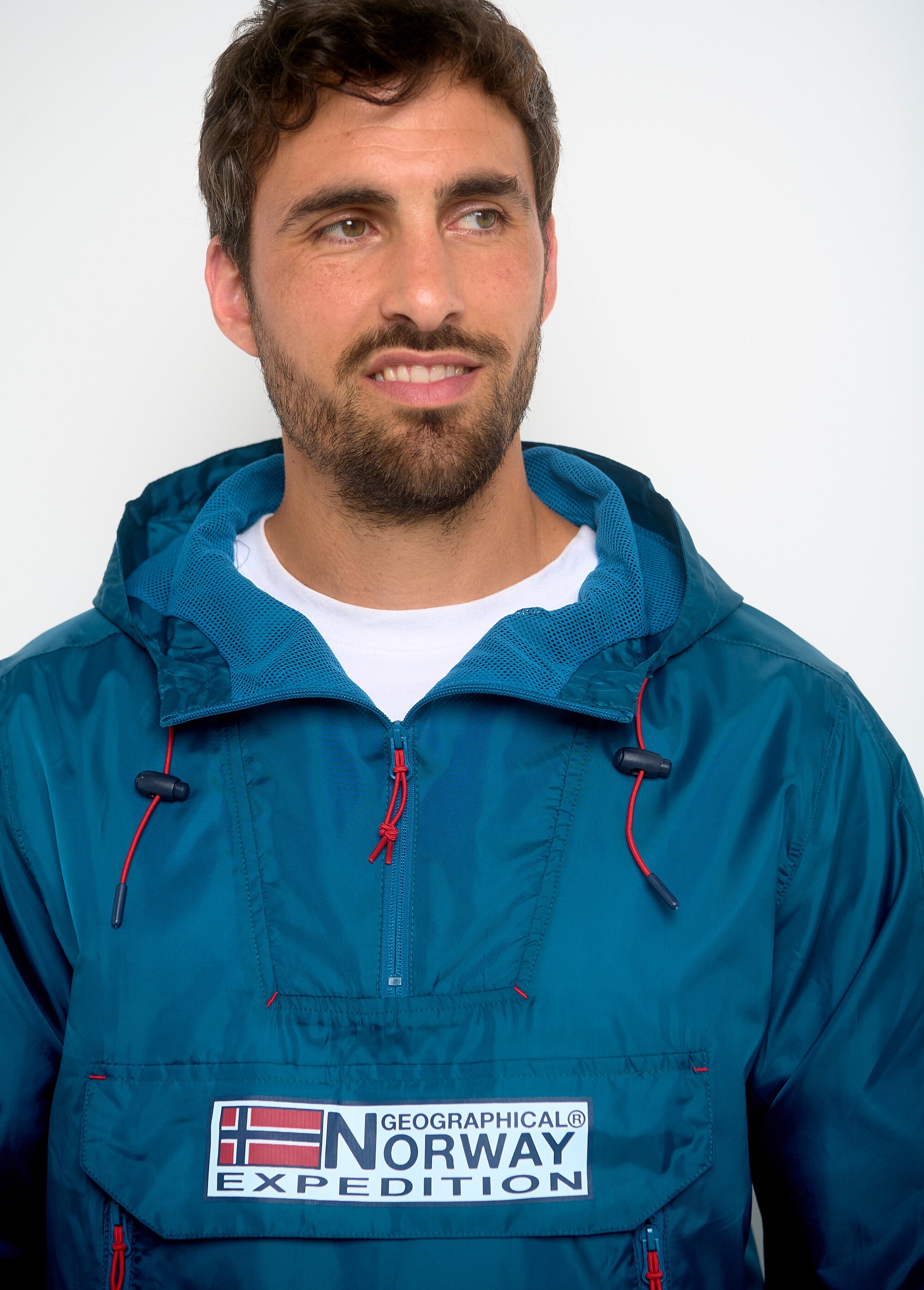 Veste coupe vent demi zip à capuche Homme THE NEW DESIGNERS Orange