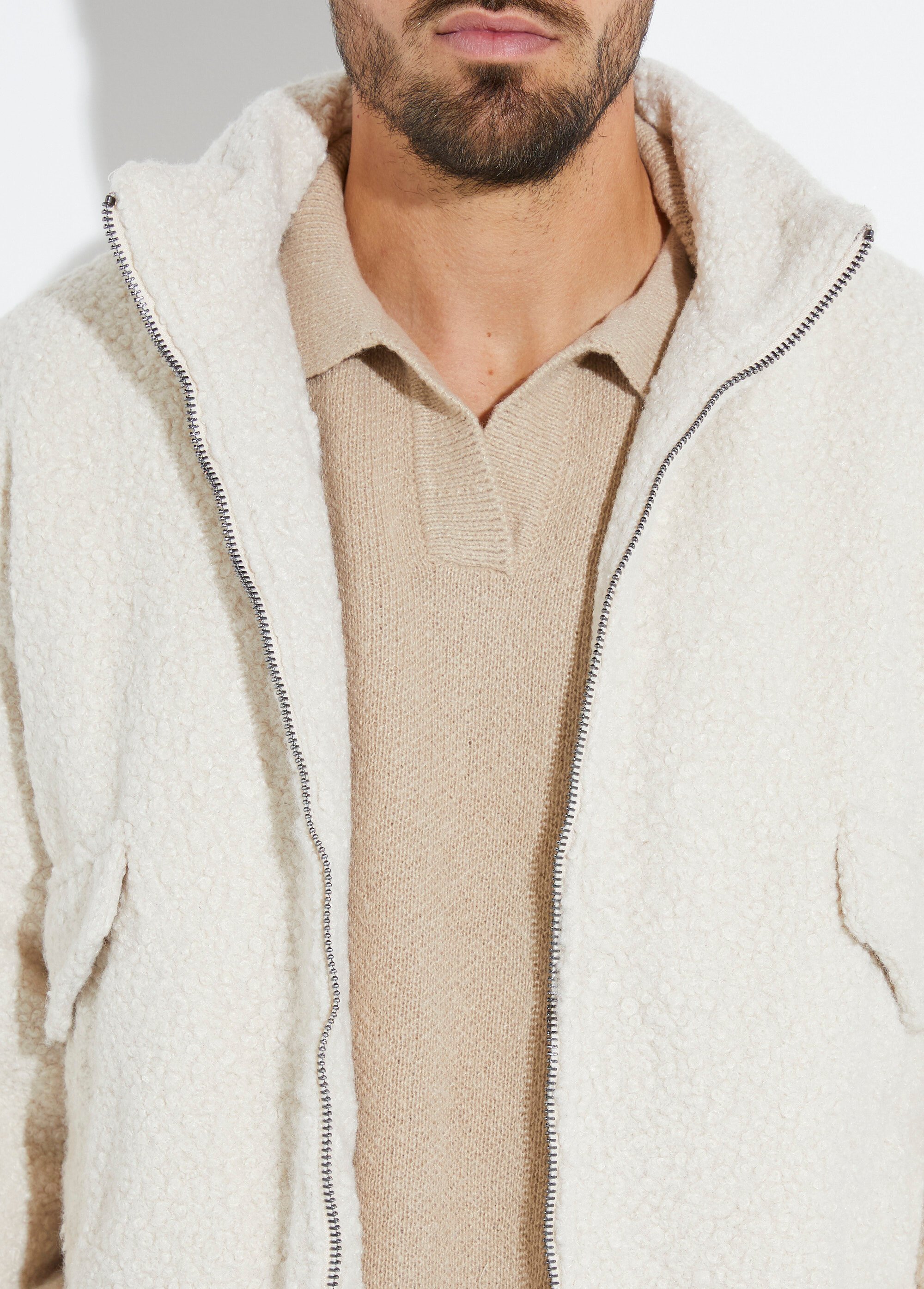 Blouson façon peau lainée, col montant