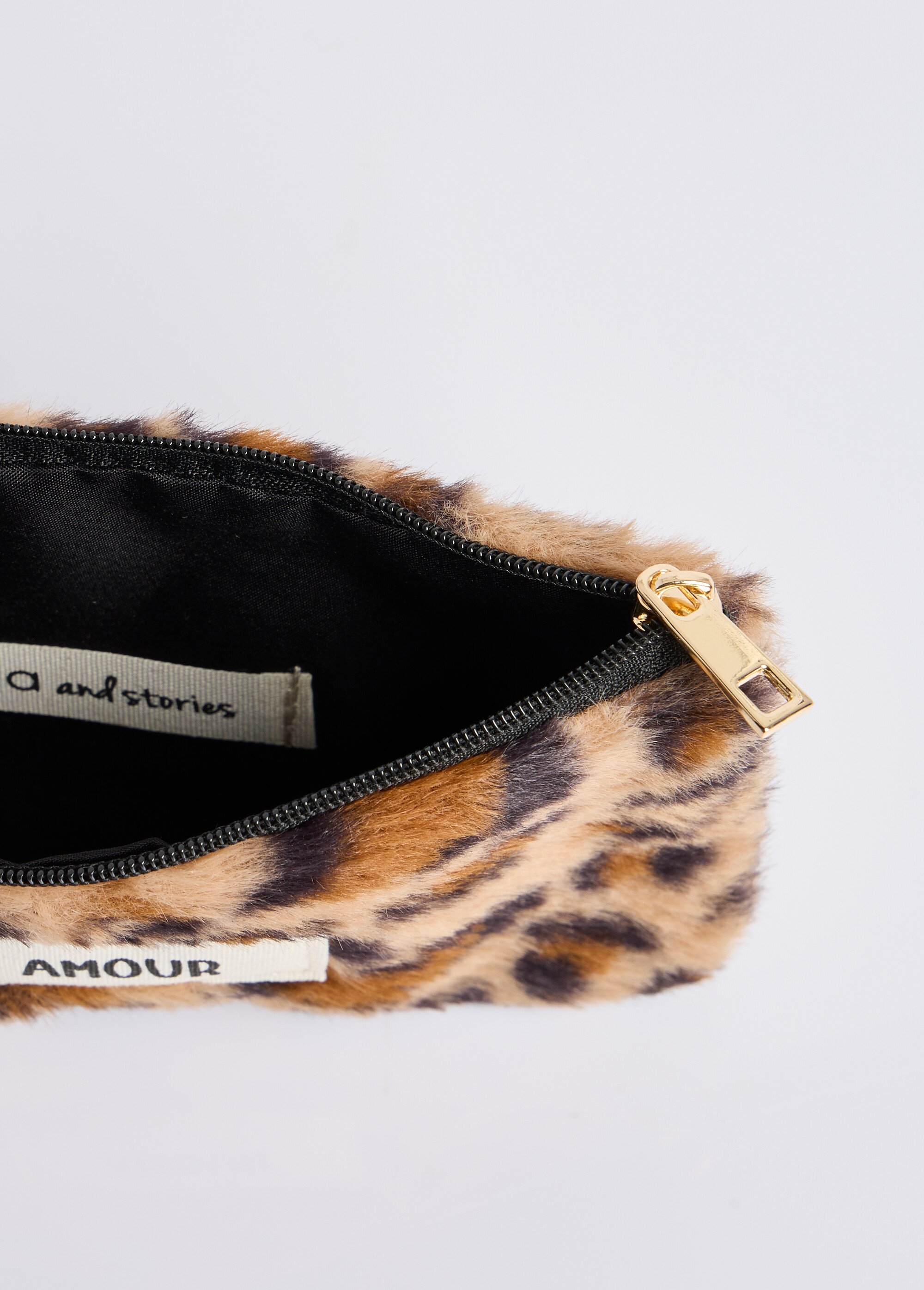 Pochette porte monnaie fourrure léopard