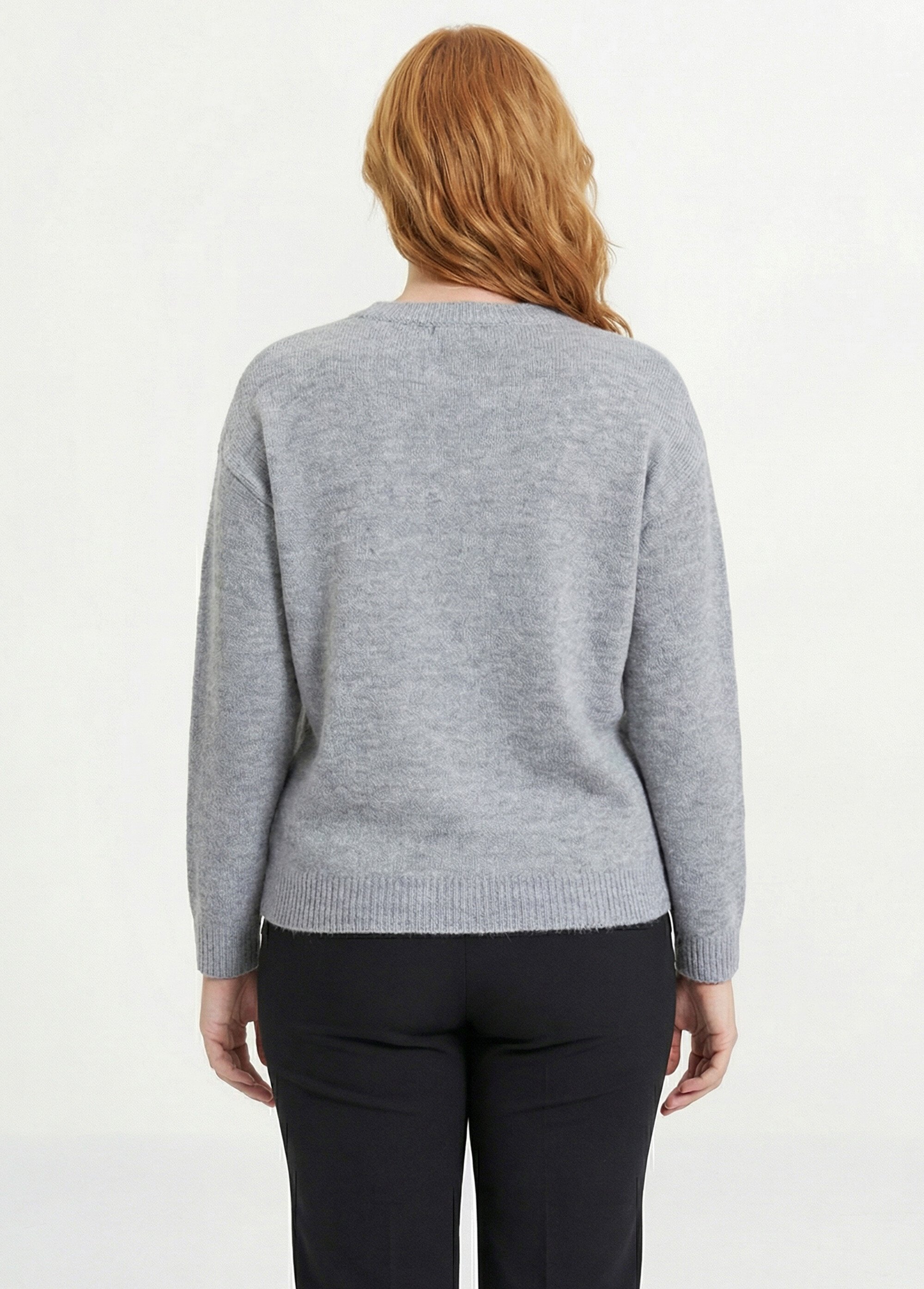 Pull doux col rond avec strass et sequins