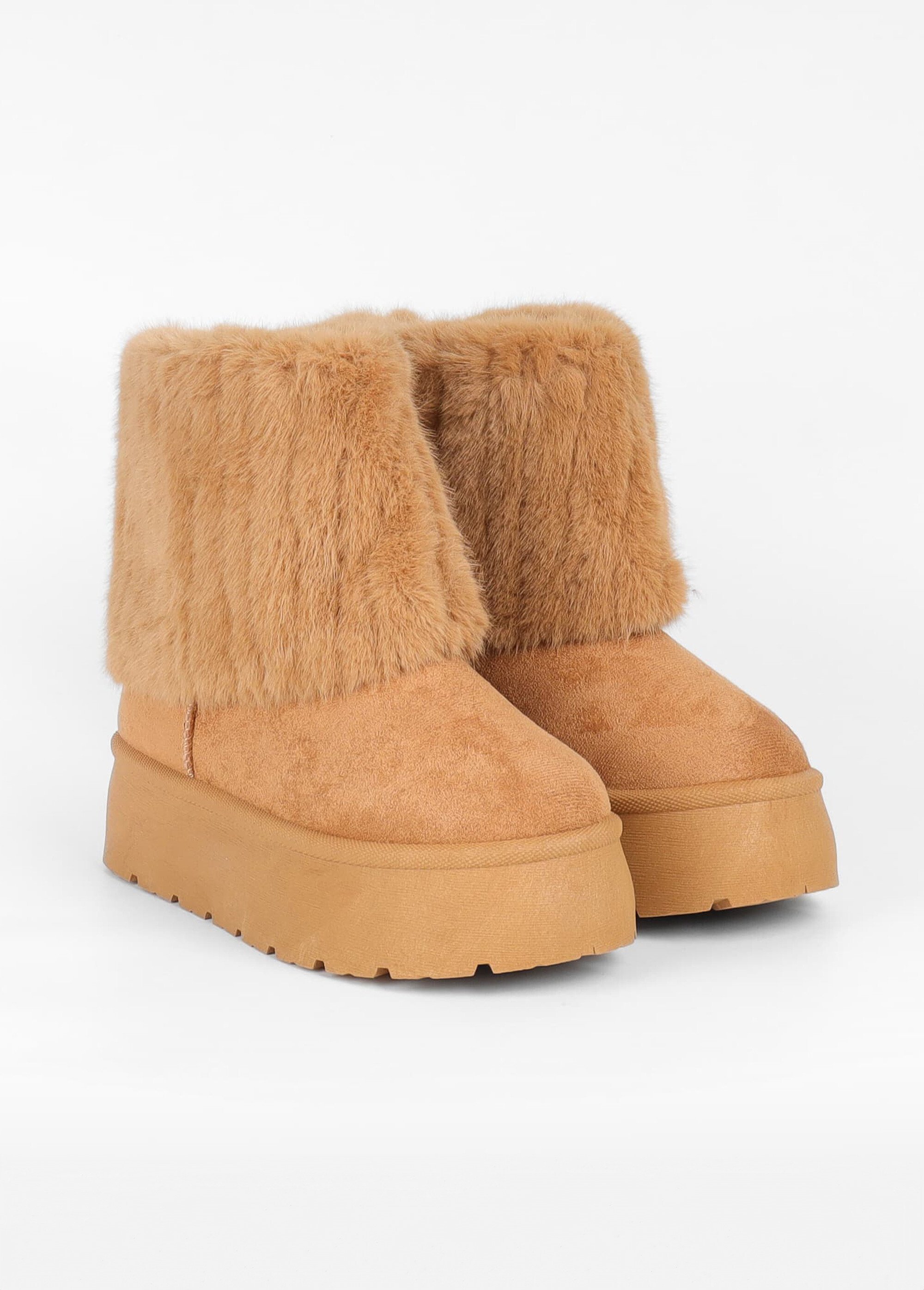 Boots compensées fausse fourrure