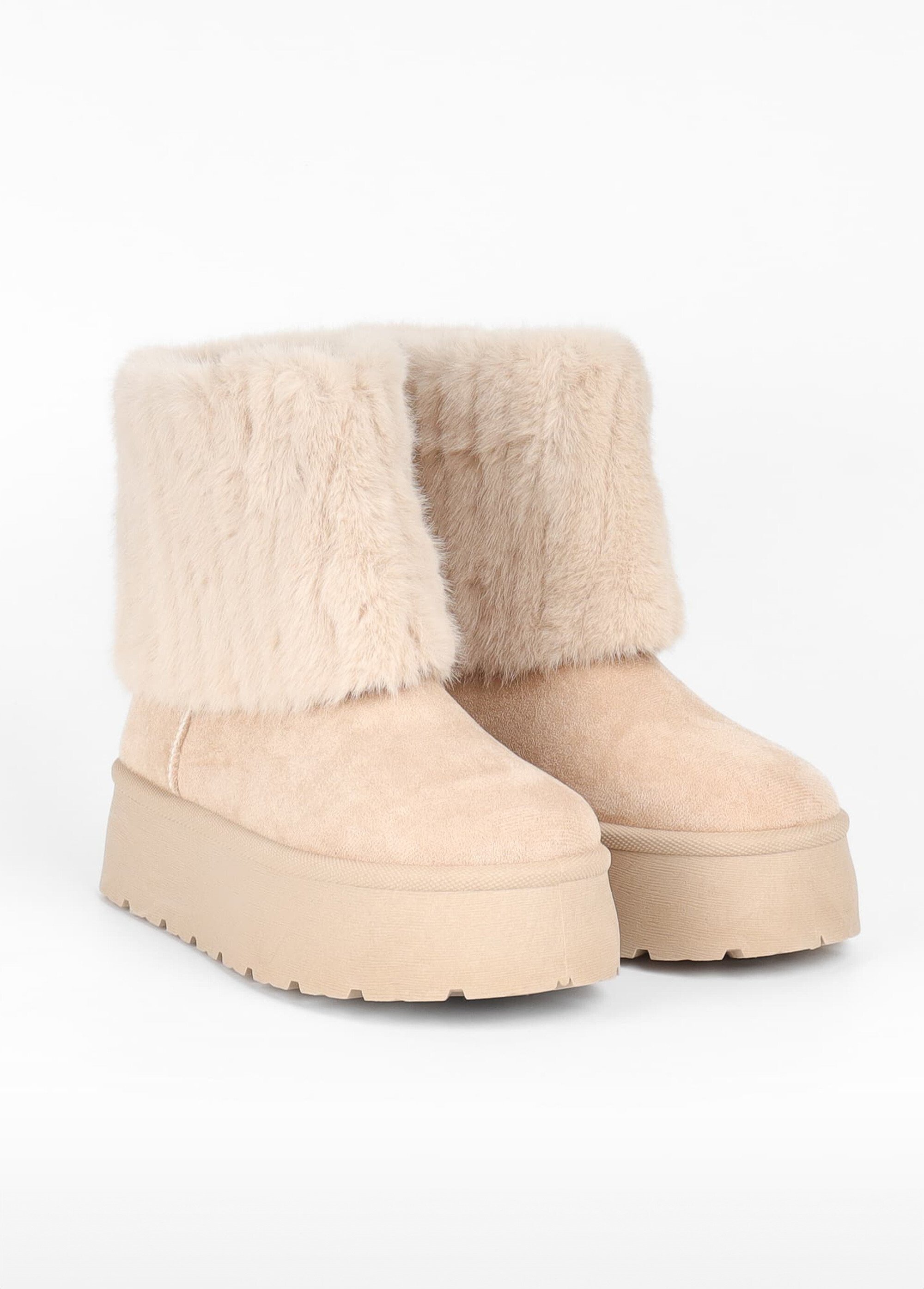 Boots compensées fausse fourrure