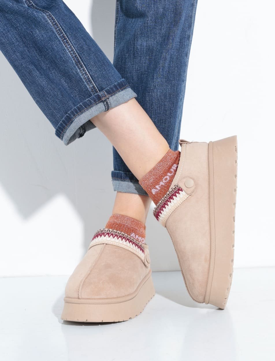 Mules compensées fourrées patte fantaisie