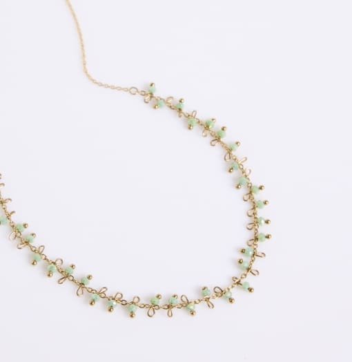 Collier avec breloques perlées acier inoxydable doré